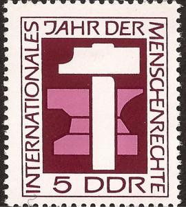 One of a number of East German postage stamps commemorating International Human Rights Year 1968. The hammer and anvil represent the right to work